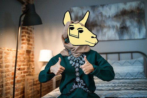 Happy cyborg llama wearing a hijab gives two thumbs up for good music teacher resources
